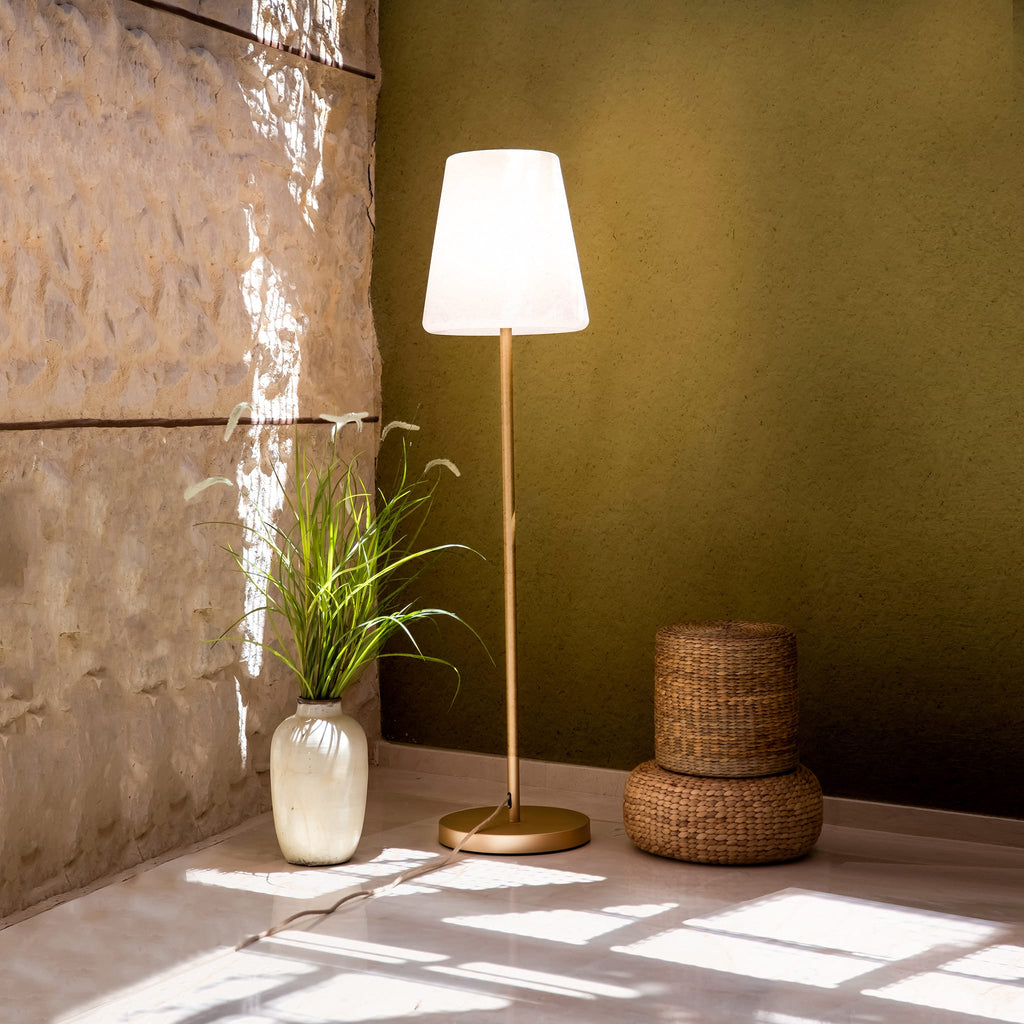 Illuminate your space with the Lola Slim 180, offering a modern metallic base and vibrant color options for indoor/outdoor use.