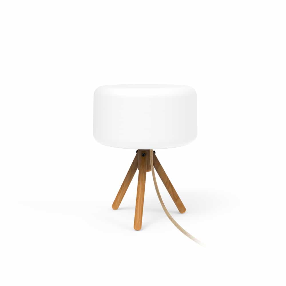 Revamp your ambiance with Chloe by Newgarden, a lamp that blends wood and polyethylene in a unique design.